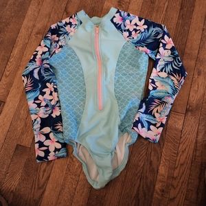Girl's long sleeve one piece rash guard. Size 7/8